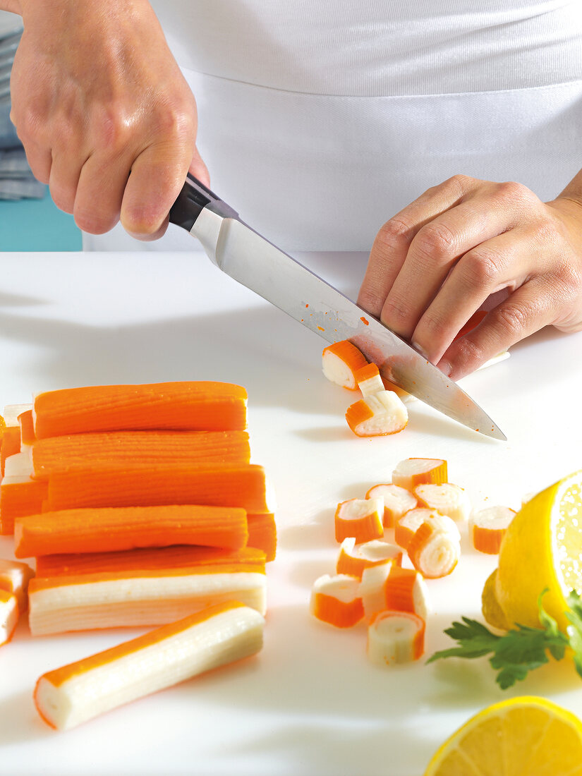Surimi being chopped into pieces