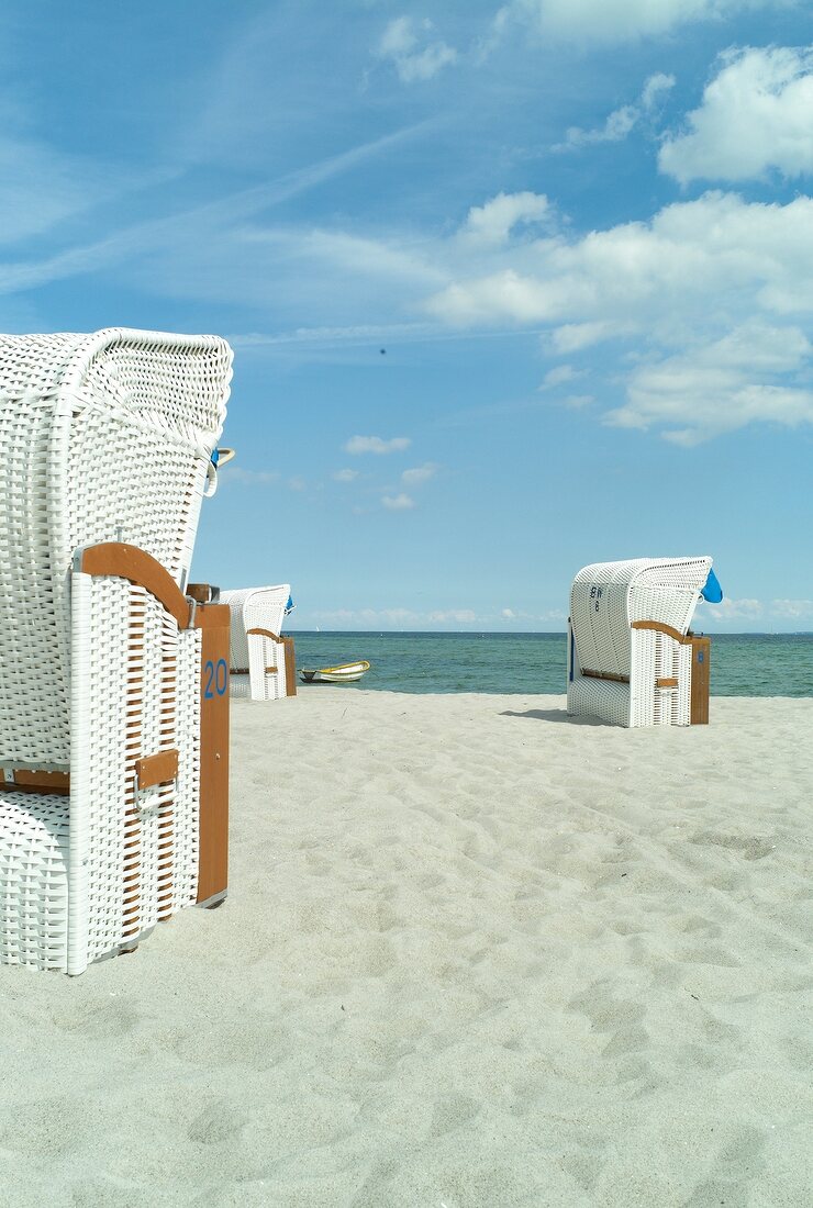 View of Sierksdorf beach with sun shade chair at Baltic Sea Coast