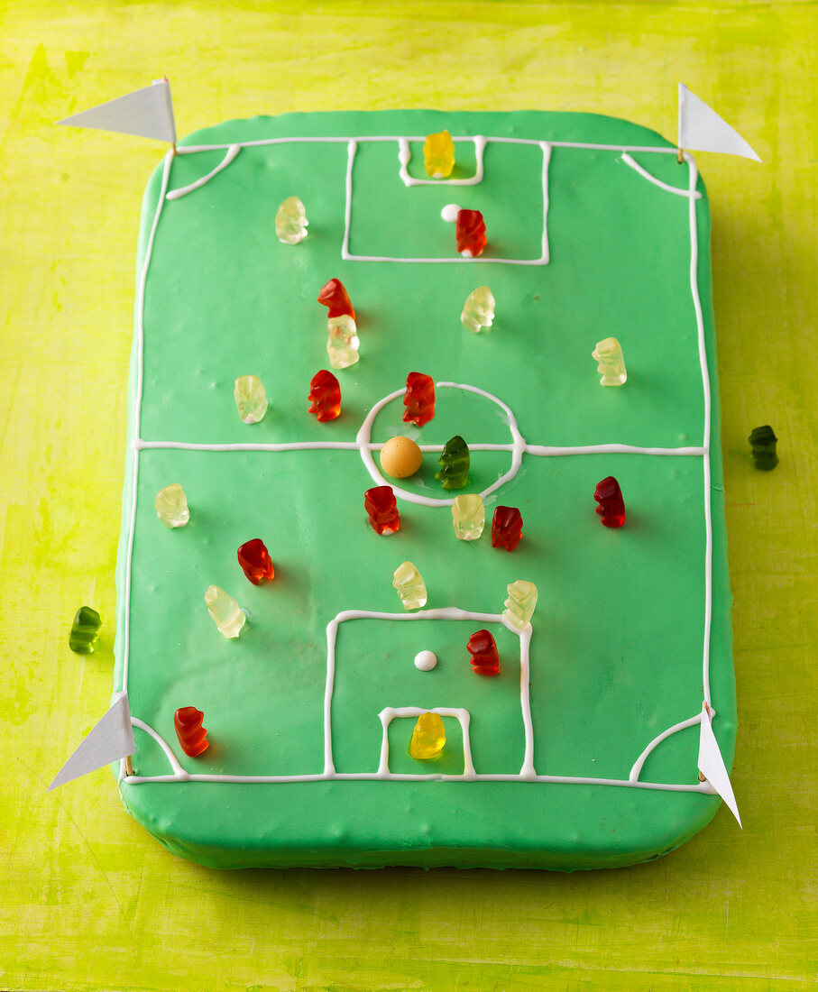 Football field shaped cake with jellies