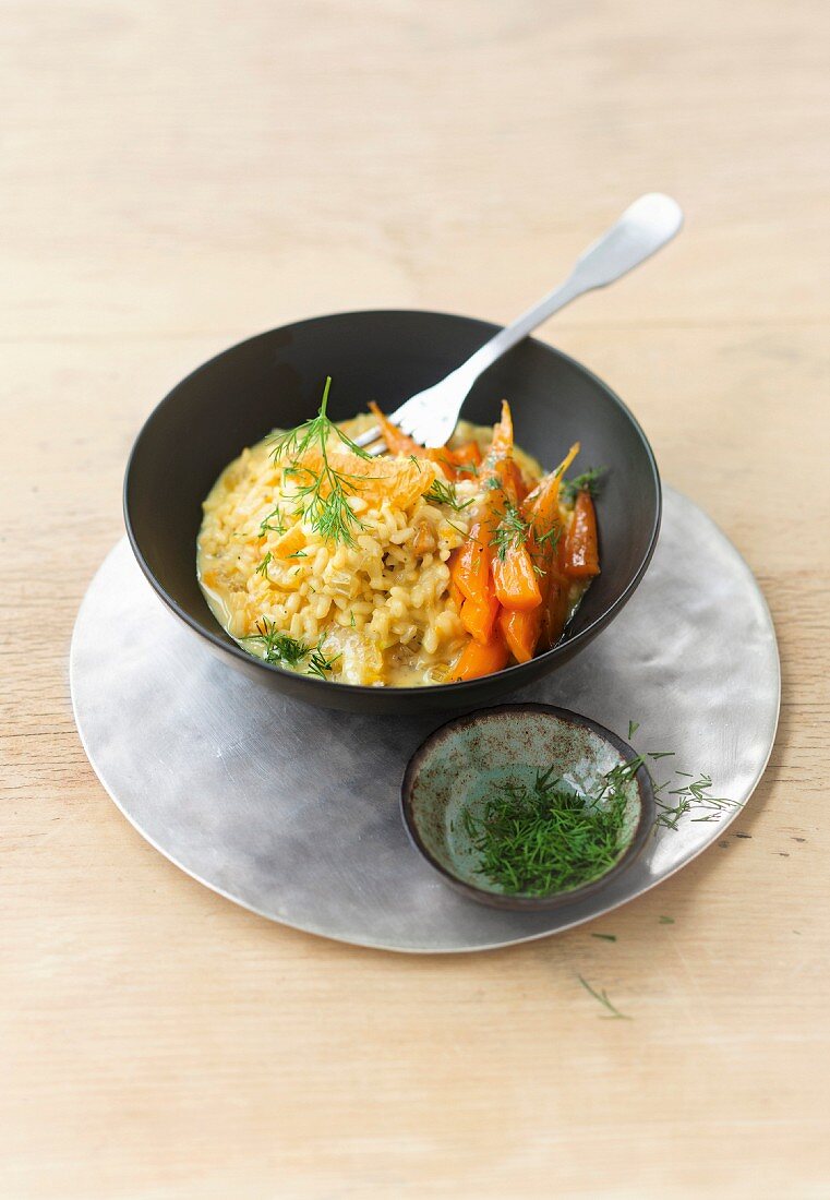 Saffron risotto with oranges and glazed carrots