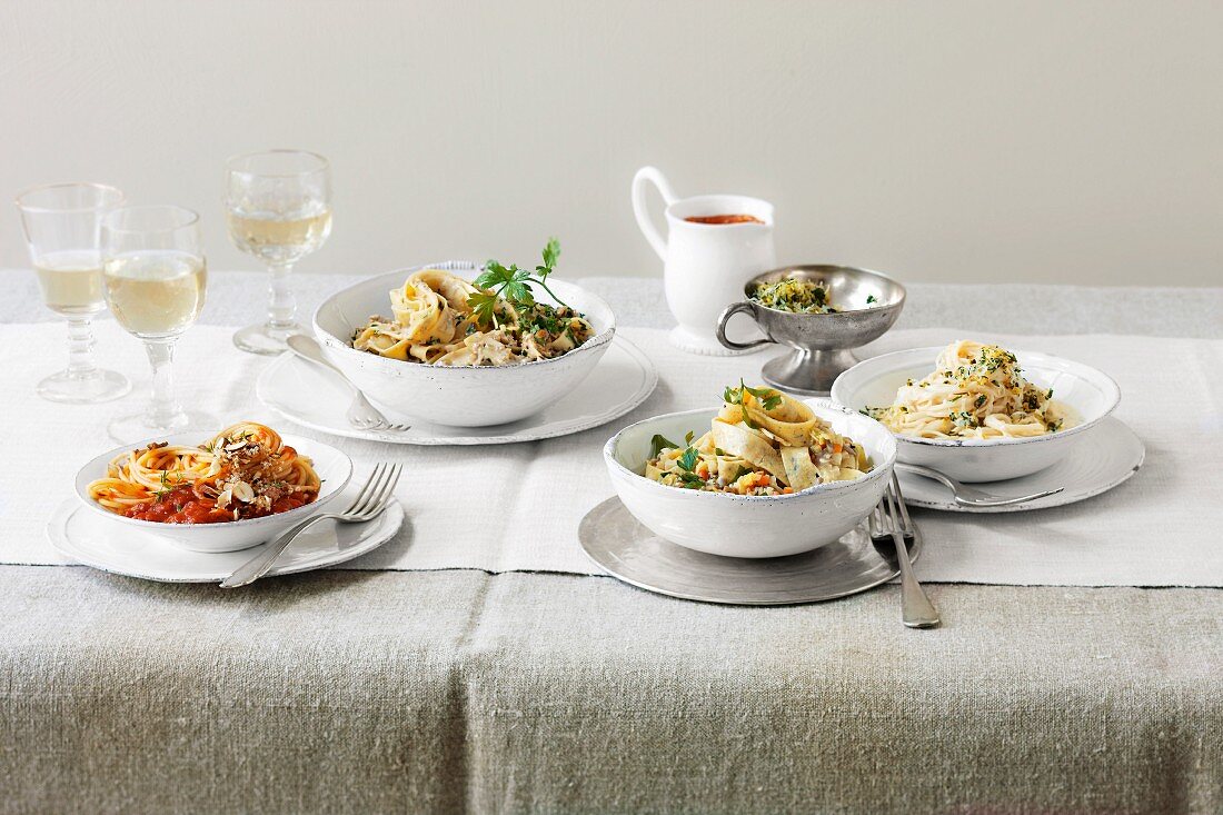Four different vegetarian pasta dishes