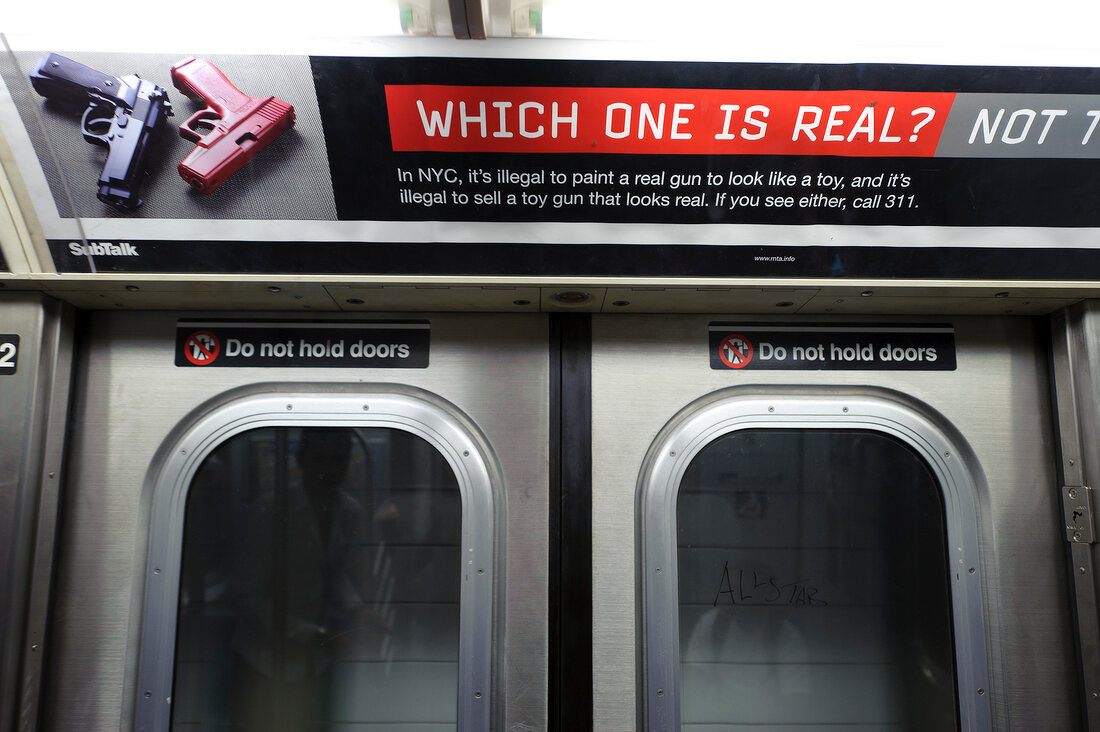 Close-up of ad on New York subway, New York, USA