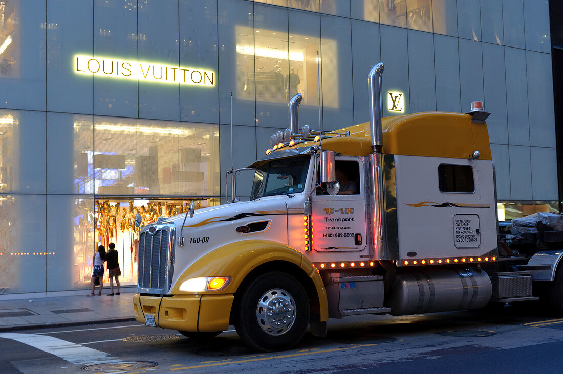 Truck in front of Louis Vuitton store, New York