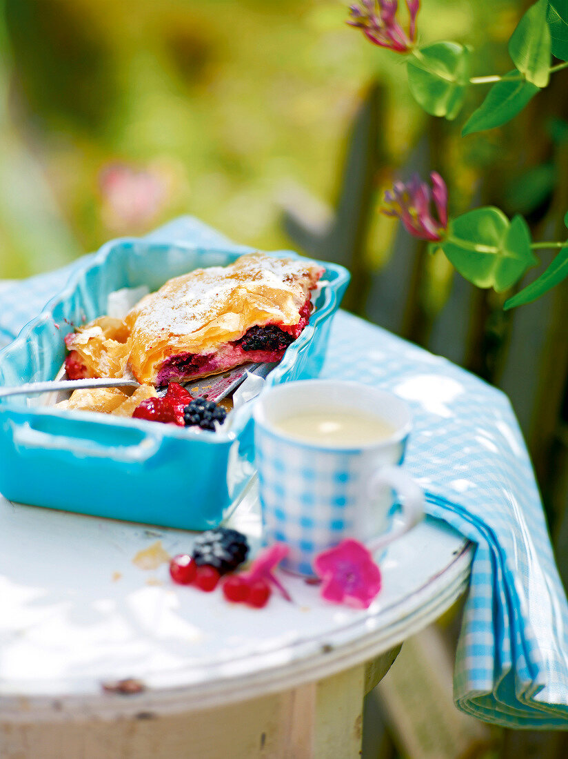 Blueberry strudel with vanilla sauce, garden kitchen