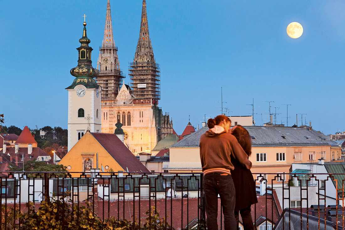 Couple kissing in front of Zagreb Funicular, Croatia