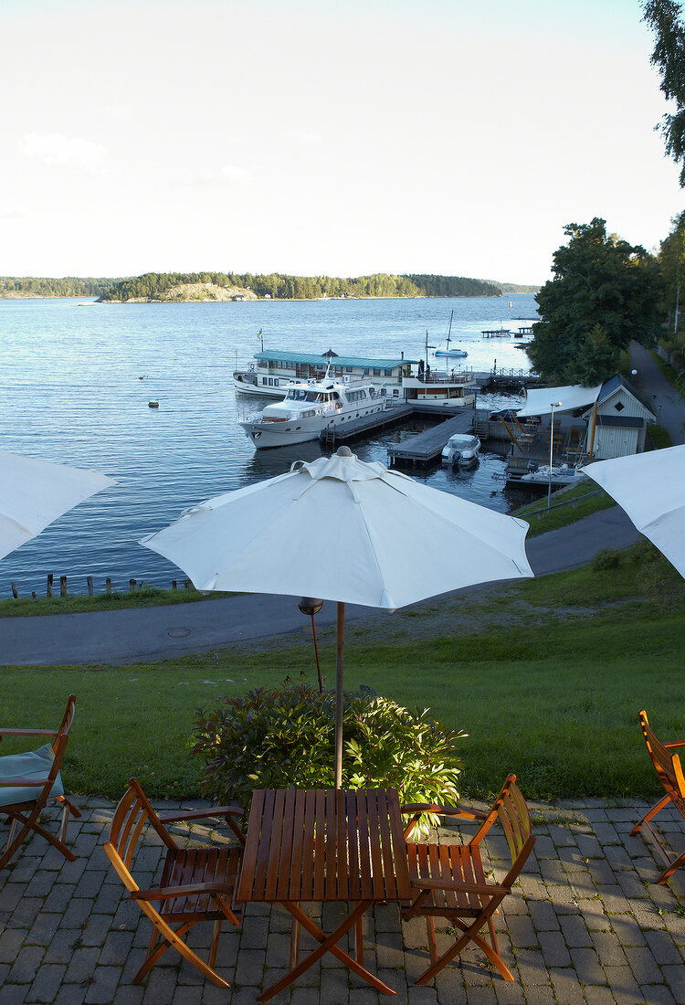 View of restaurant Oaxen Krog terrace overlooking the sea, Stockholm