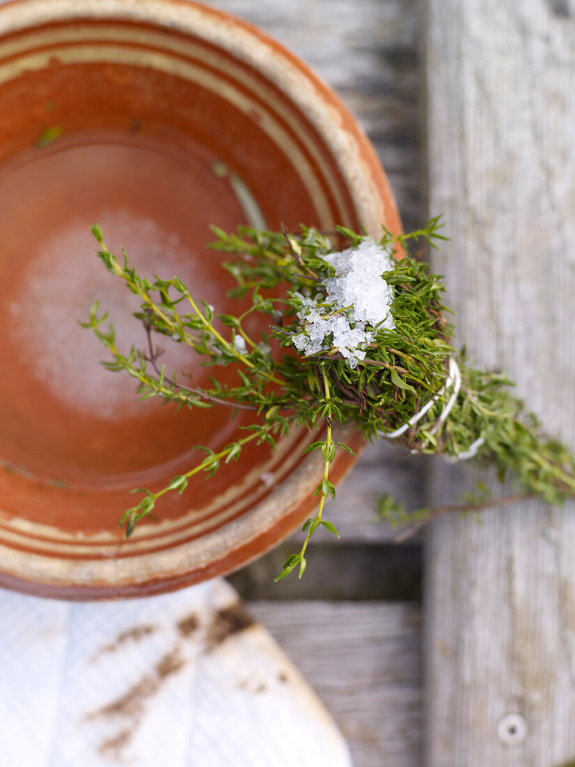 Herbal bouquet with sea salt on bowl