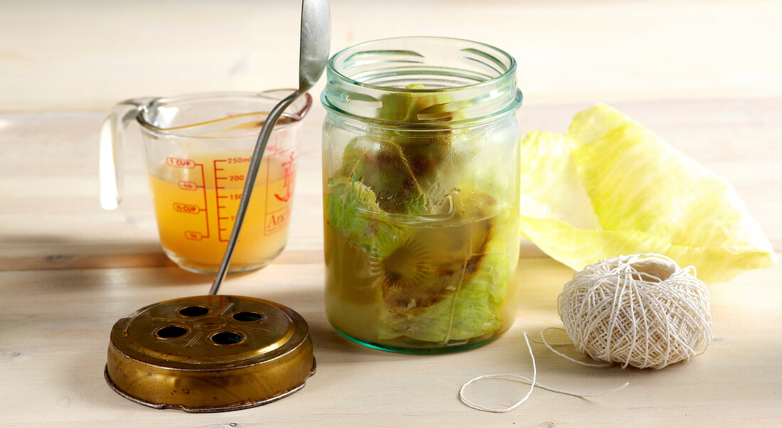 Close-up of ingredients for canning cabbage rolls in jar