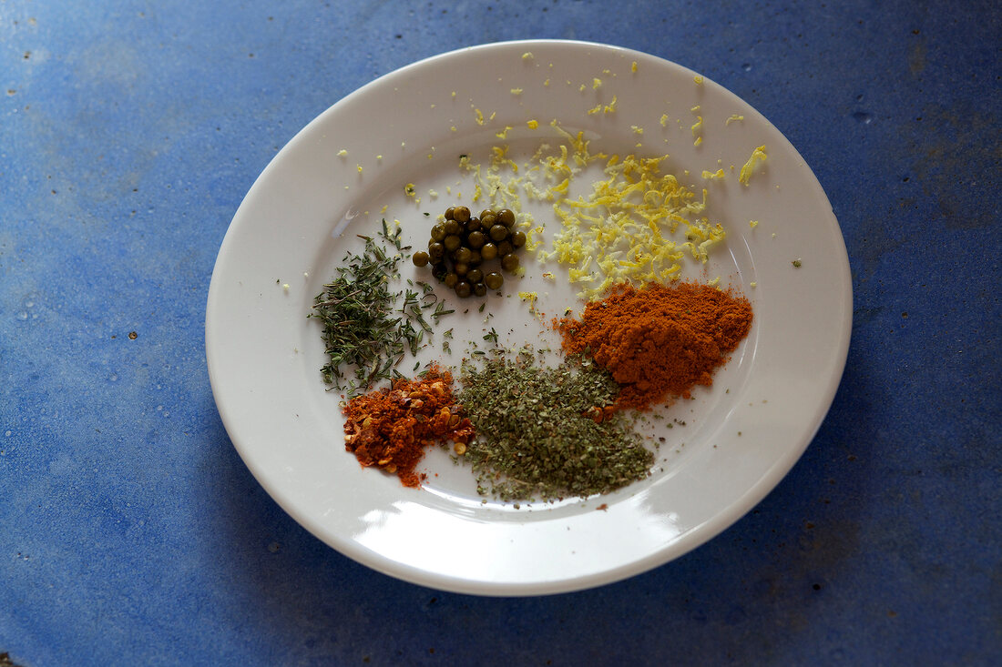 Various homemade spices for sausage on plate