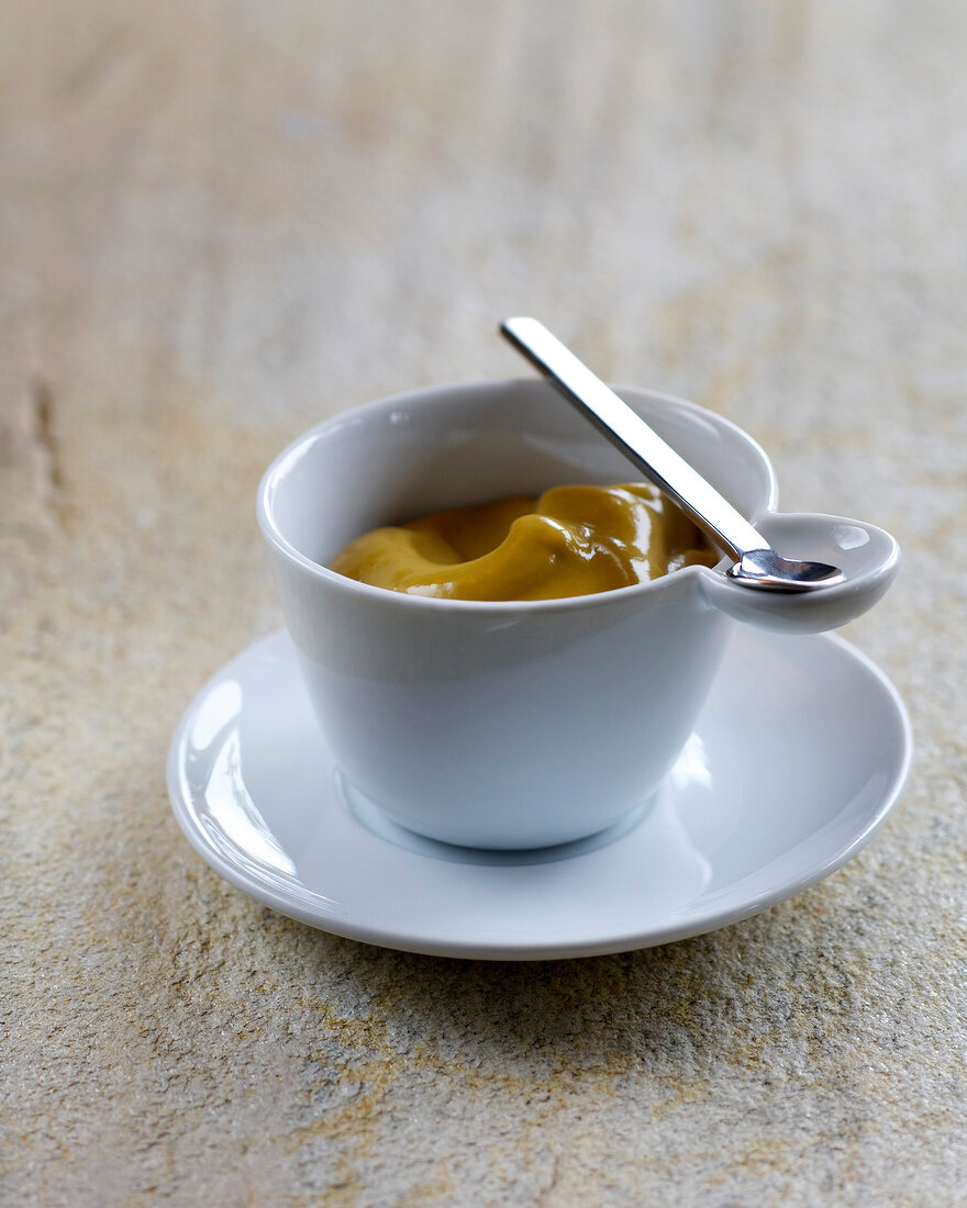 Homemade mustard puree in cup