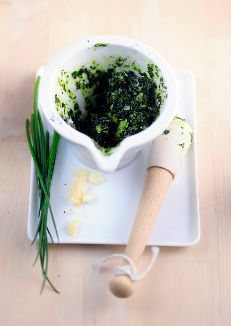 Poppy pesto in mortar on plate