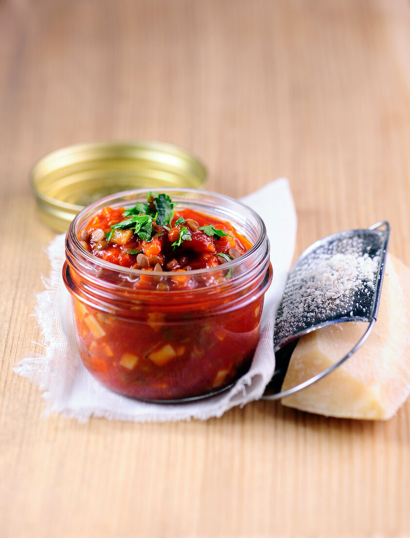 Vegetarian lentil bolognese sauce in glass jar