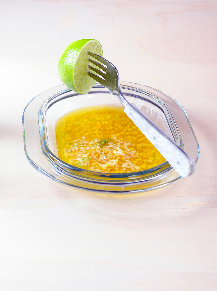 Honey and ginger marinade in glass bowl
