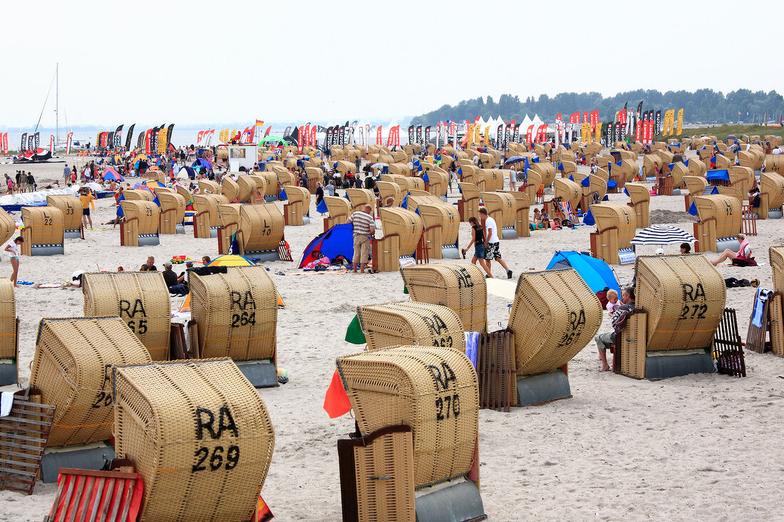 Hooded beach chairs on Baltic coast in Fehmarn, Schleswig-Holstein, Germany