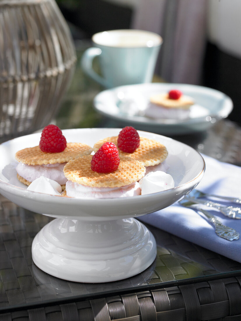 Tart with Belgian waffles and strawberry on cake stand