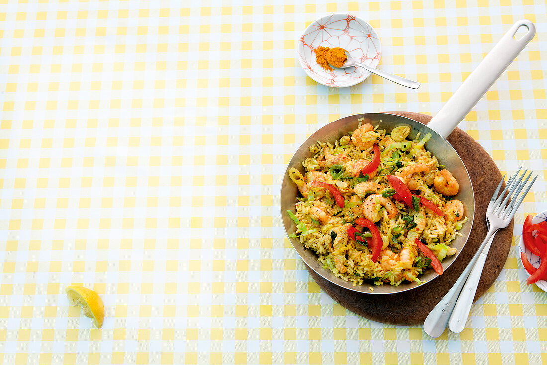Fried rice with prawns in pan, overhead view