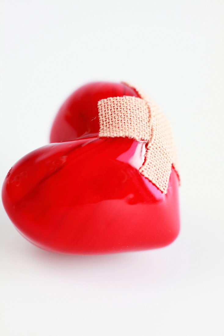 Close-up of heart with bandage