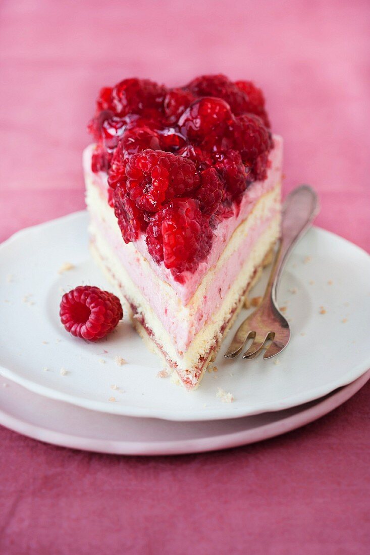 A piece of raspberry cream cake