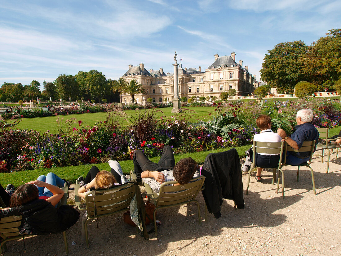 Tourists relaxing in Jardin du Luxembourg Garden, Paris, France