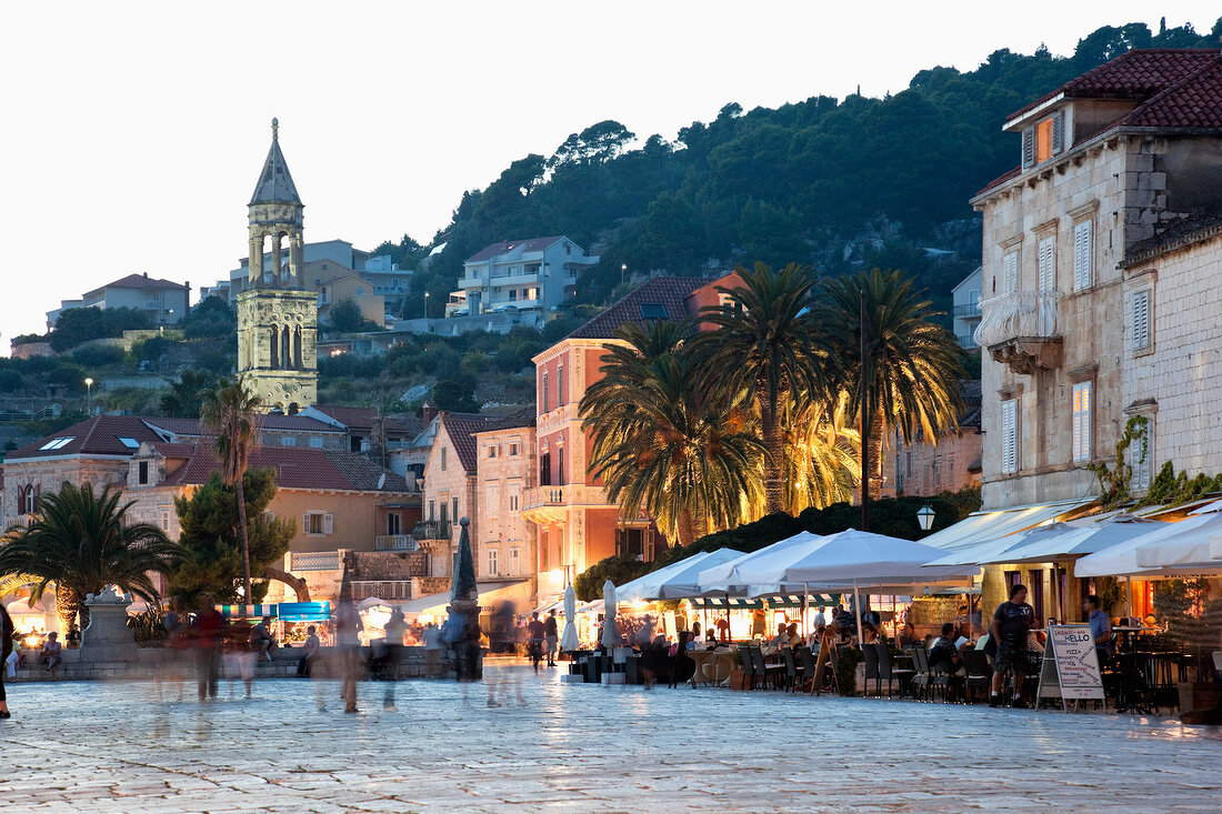 People at Hvar old town at twilight in Croatia