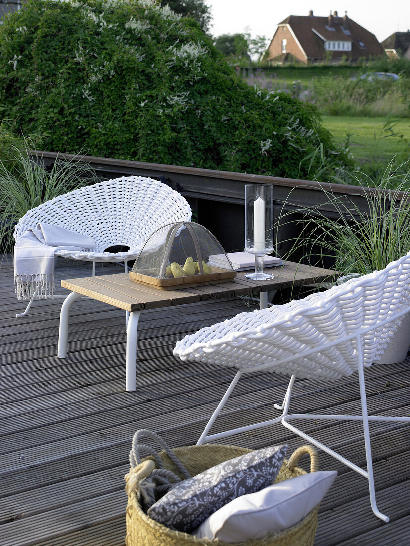 White bucket seat with coffee table