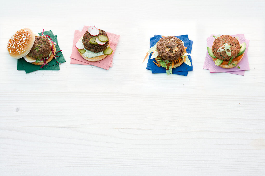 Four different type of hamburger on white background