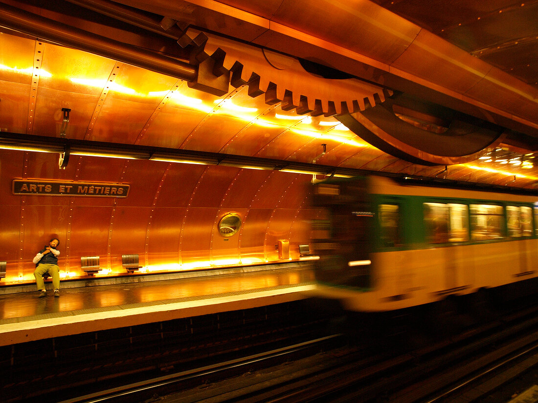 Senior woman waiting at Arts et Metiers metro station in Paris, France