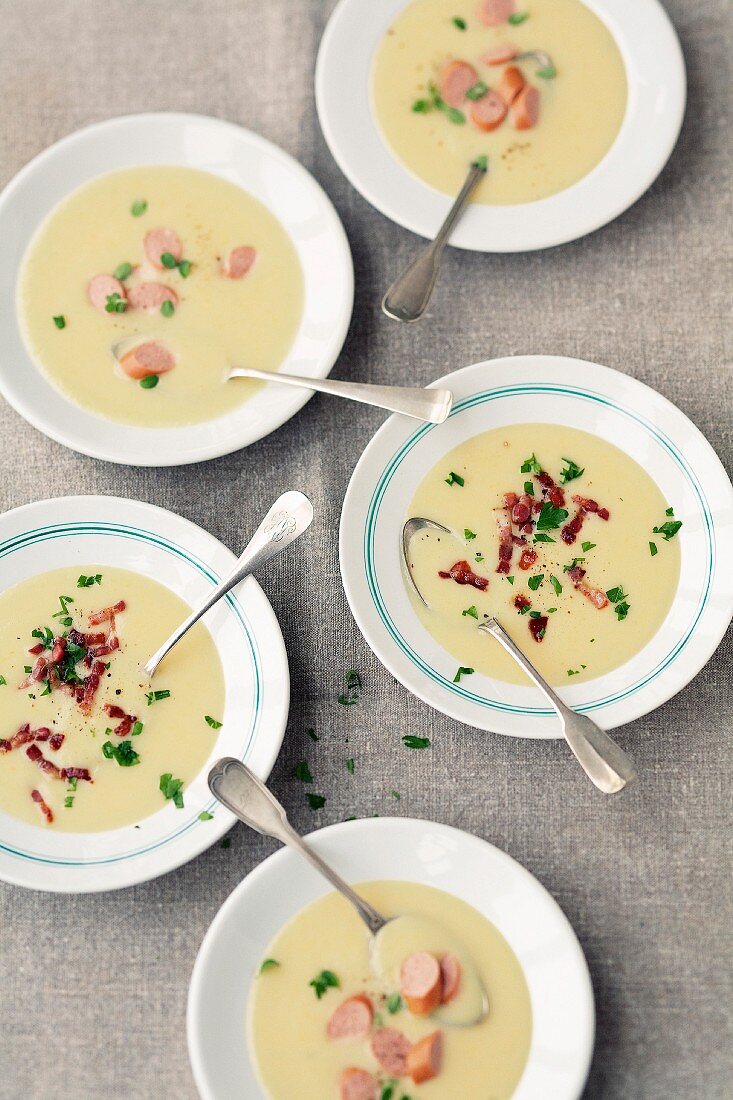 Potato soup with hotdog sausages and potato soup with bacon