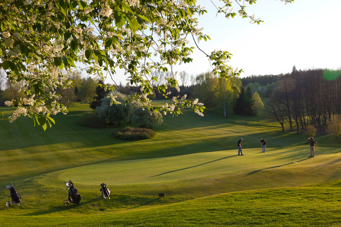 People playing at perennials golf course in Anhausen at Augsburg, Bavaria, Germany