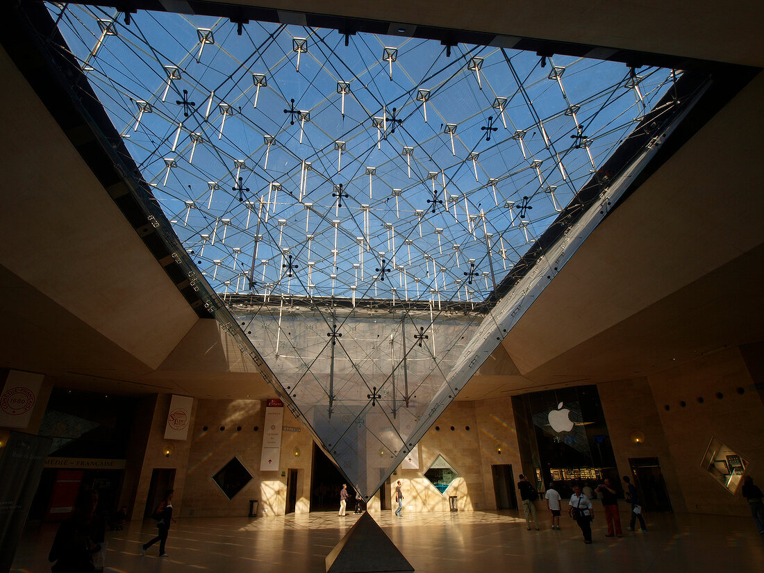 People at Louvre Museum entrance in Paris, France