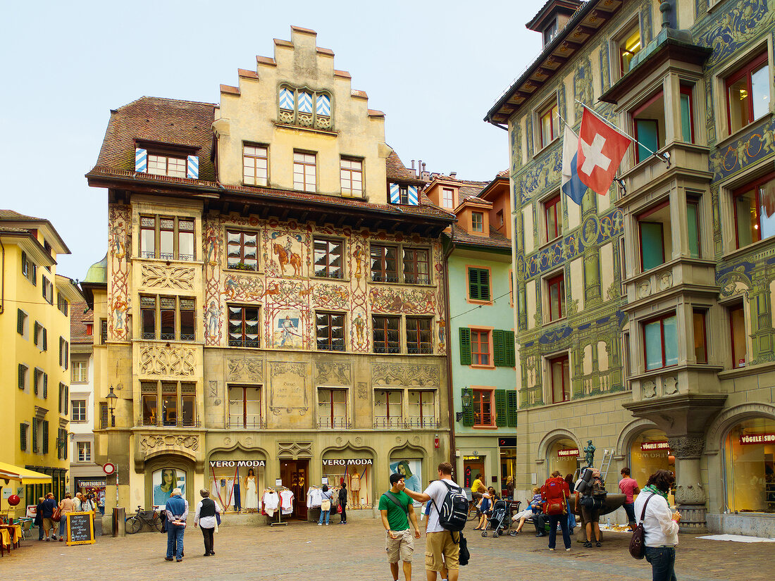 People at facade of Hirschenplatz in Lucerne, Switzerland