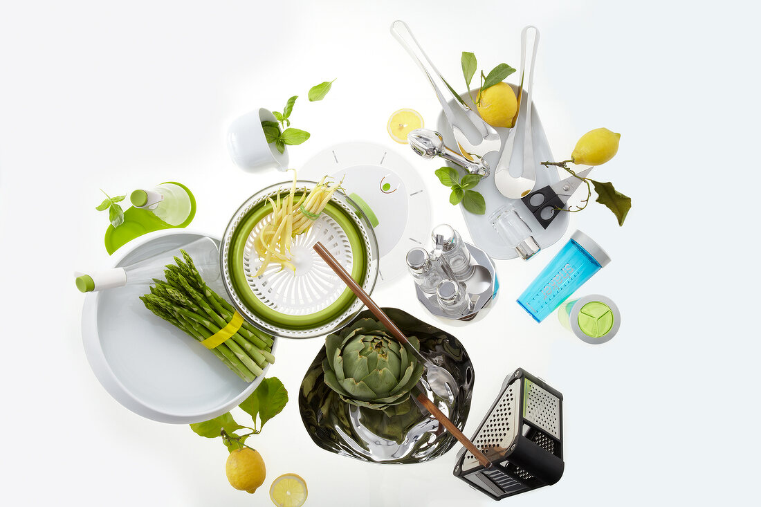 Different kitchen gadgets on white background