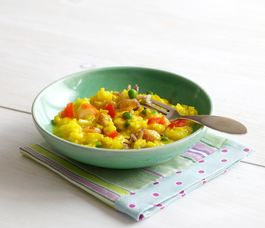 Paella stew in serving dish