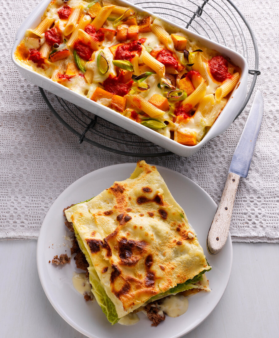 Cabbage and lamb lasagne with pumpkin pasta in baking dish