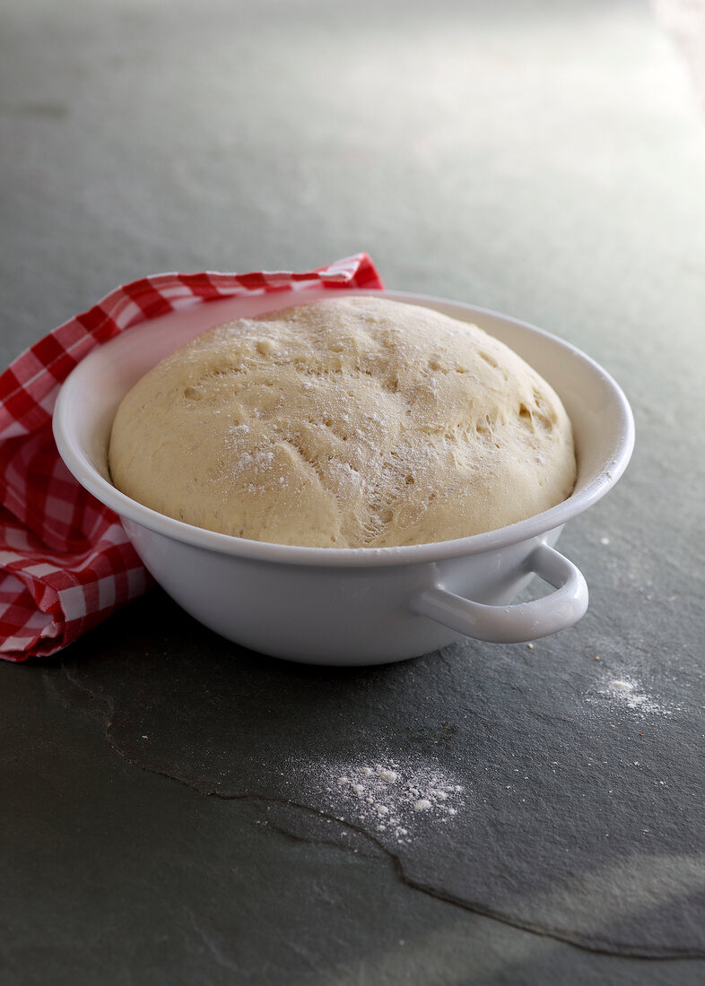 Pizza dough in bowl