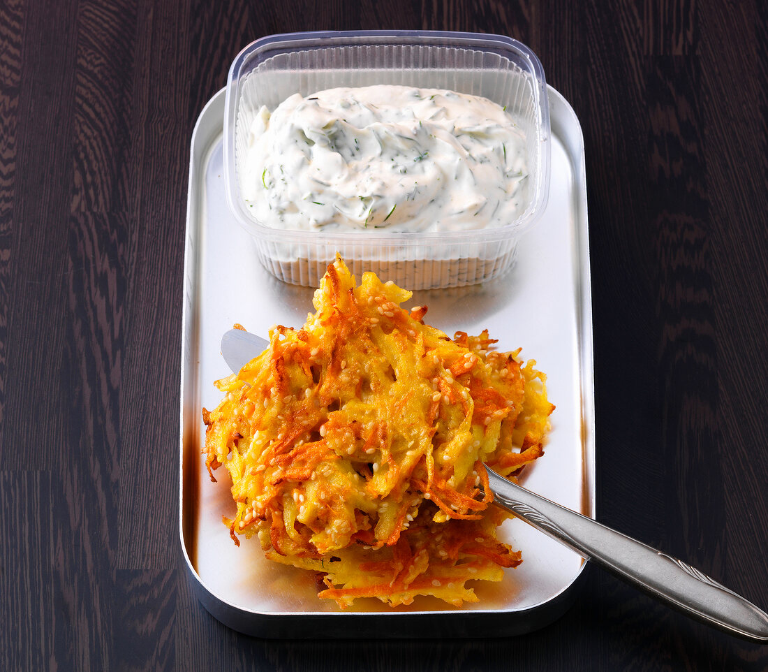 Carrot and potato rosti in serving dish