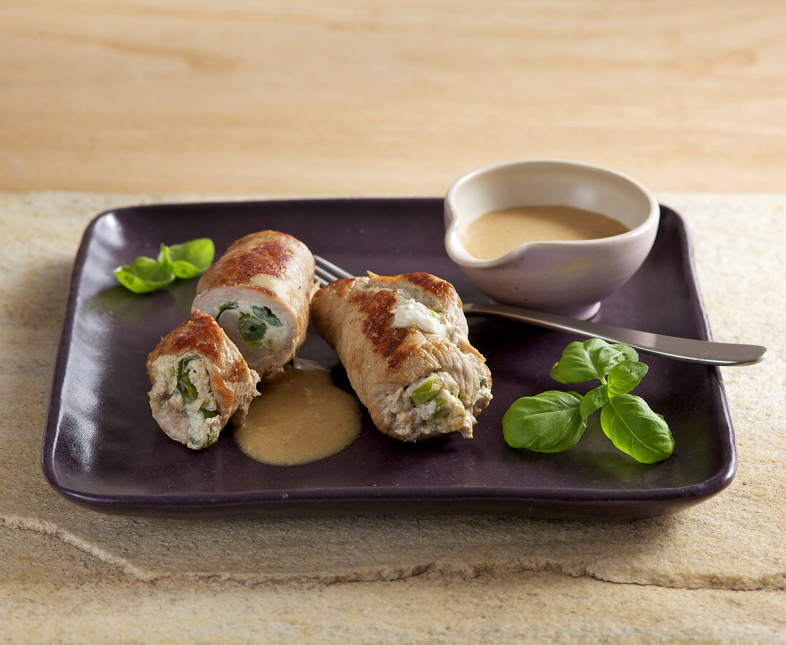 Stuffed veal rolls on tray