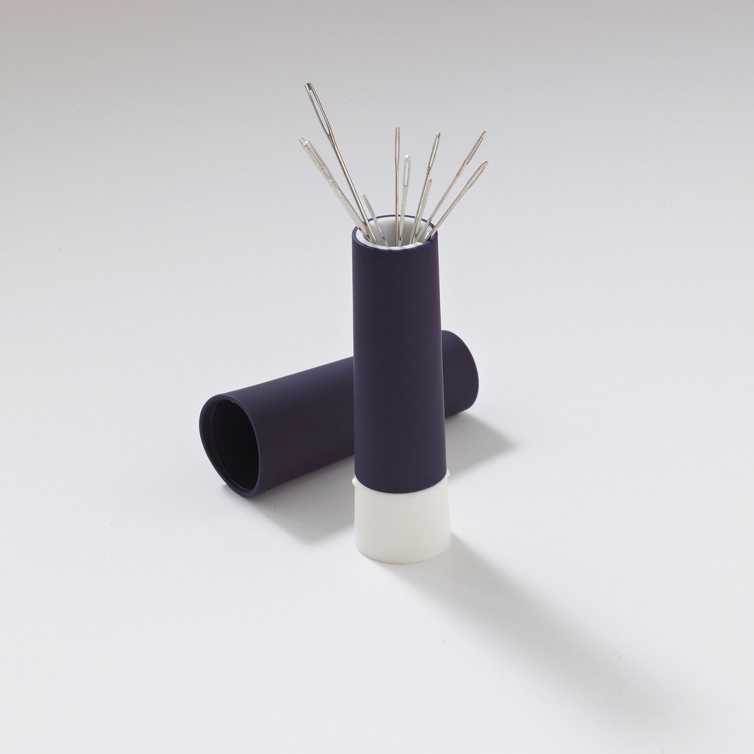 Purple needle twister on white background