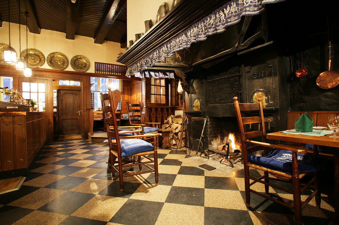 Old interiors and fireplace in restaurant