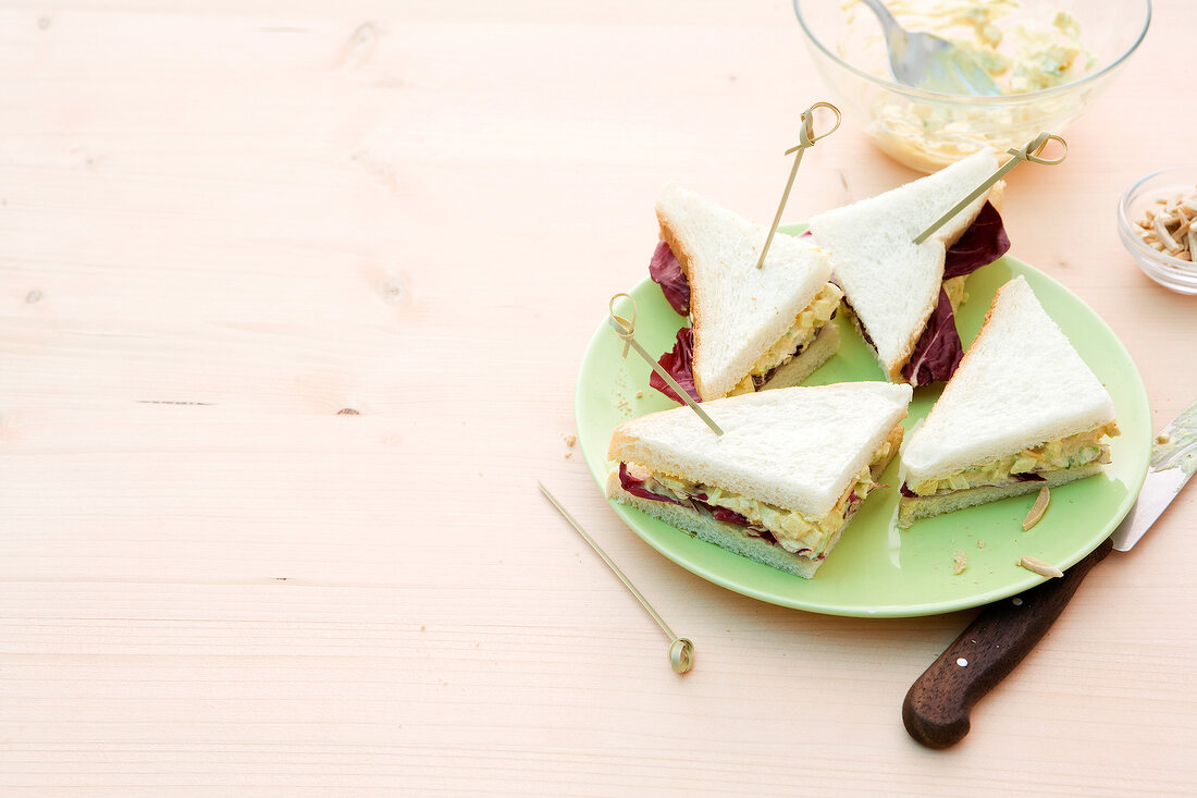 Tramezzini with apple and leek cream on plate