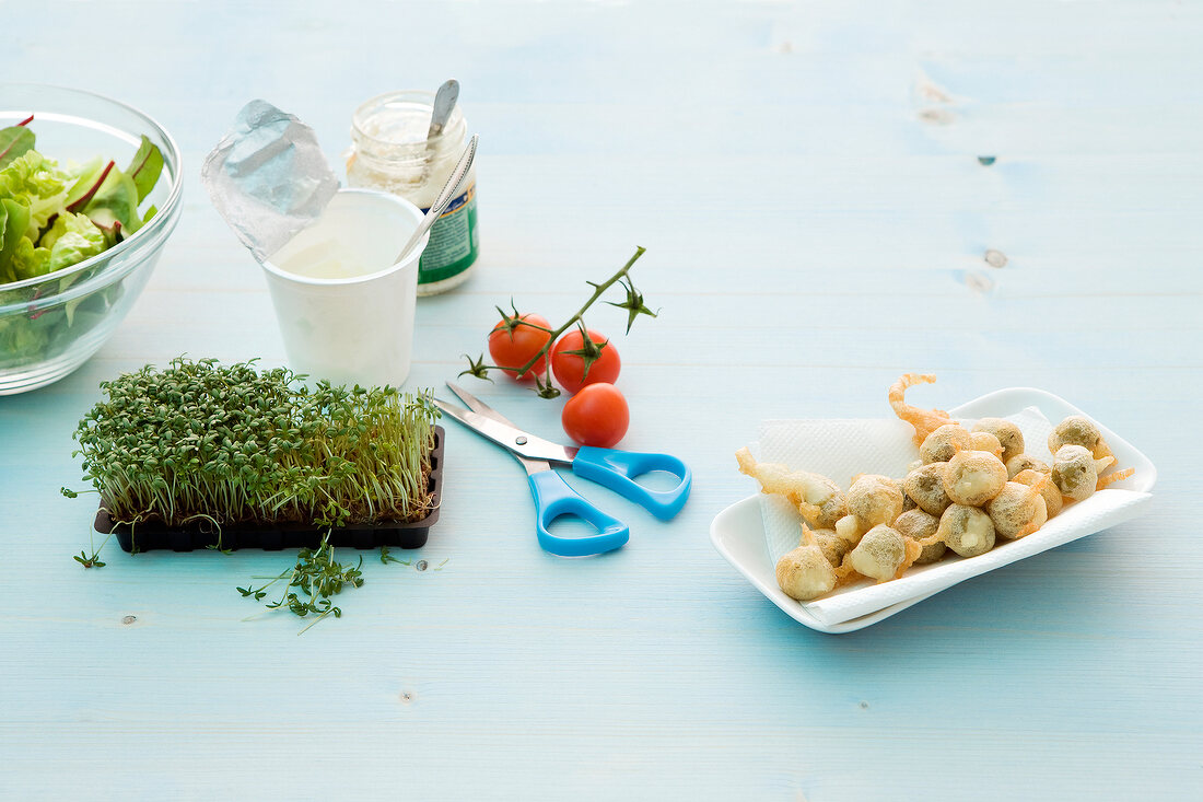 Ingredients for salad on blue background