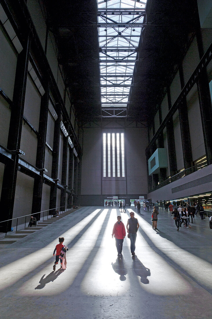 People at hall of Tate Modern Gallery in London, UK