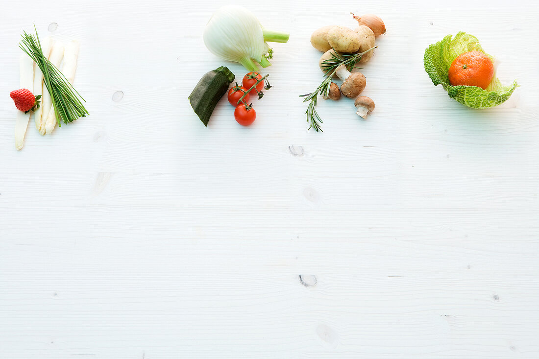 Various fresh vegetables on white background