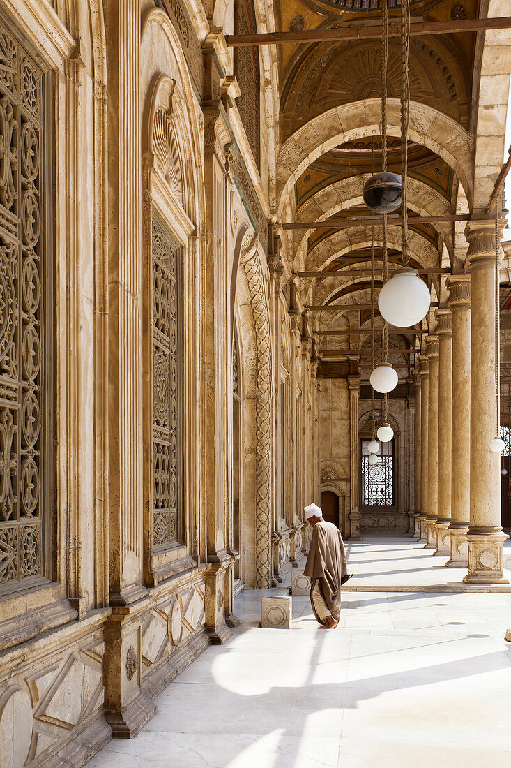 Man at courtyard of Muhammad Ali Mosque, Cairo, Egypt
