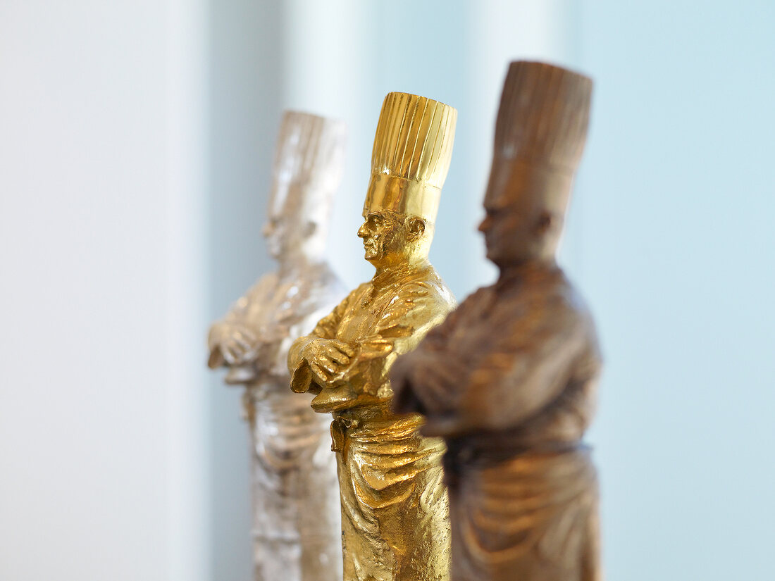 Close-up of gold, silver and bronze The Bocuse d'Or trophies