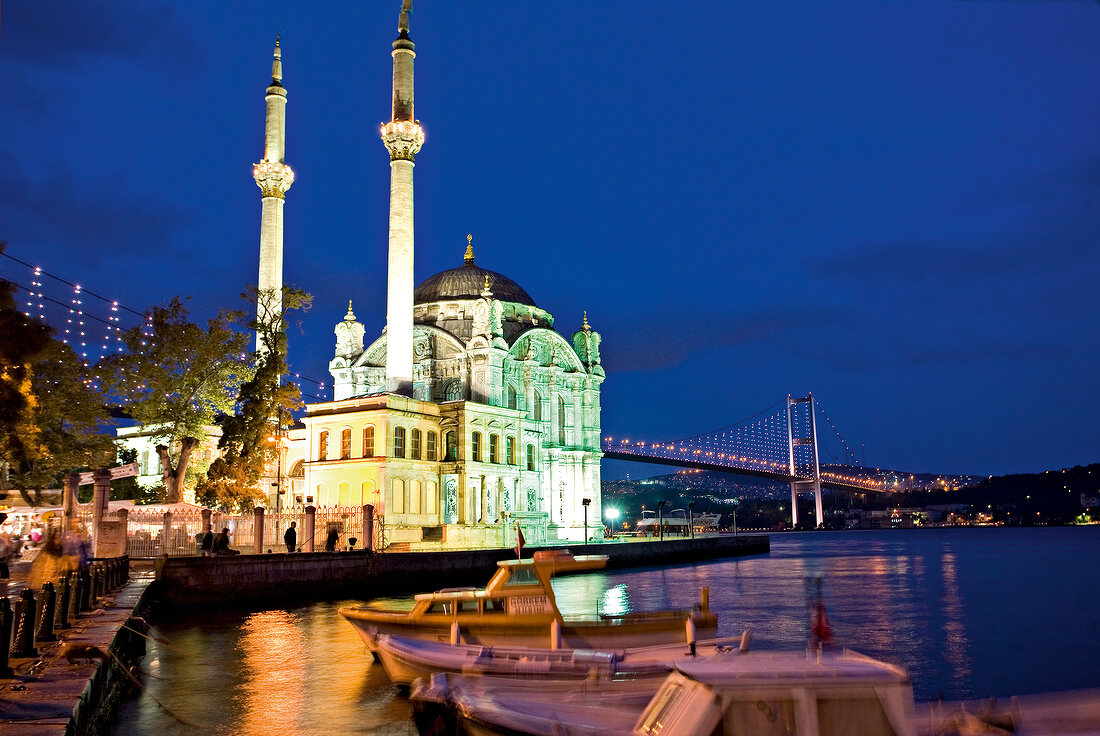 Illuminated Mecidiye mosque with waterfront at night, Bosphorus, Turkey