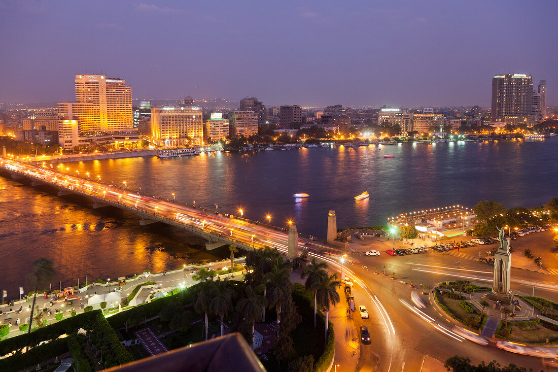 Cityscape of illuminated Tahrir Square and Tahrir Bridge, River Nile, Cairo, Egypt
