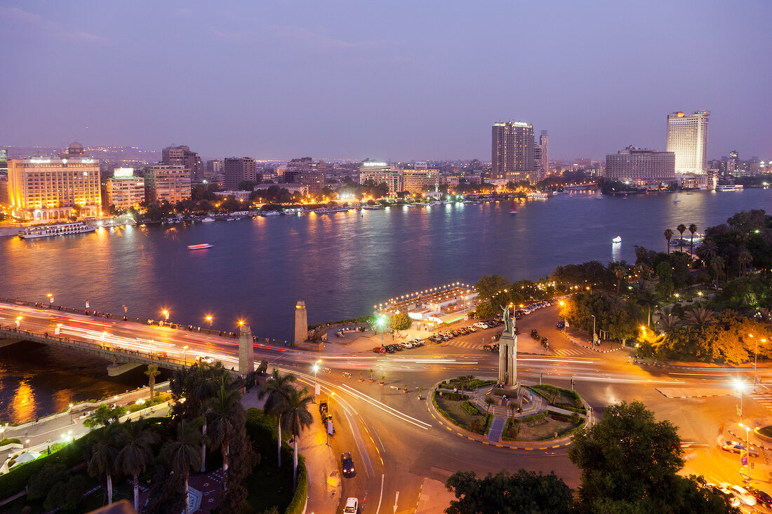 Cityscape of illuminated Tahrir Square and Tahrir Bridge, River Nile, Cairo, Egypt