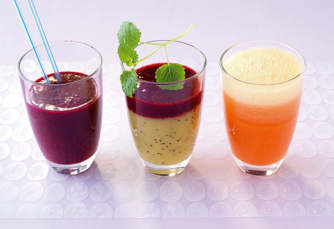 Three types of fruity drinks in glass