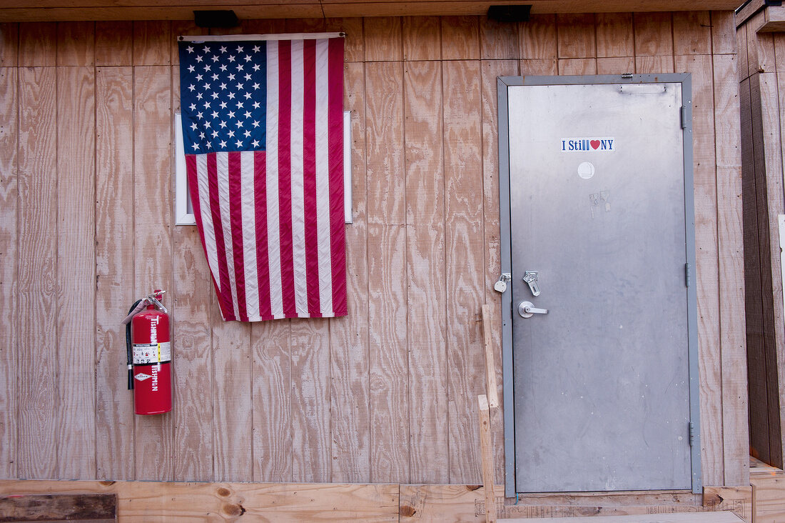 American flag hanging on construction shed in Ground Zero, New York, USA